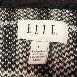 ELLE Black and White Knit Sweater with stunning black sleeveless cocktail dress
